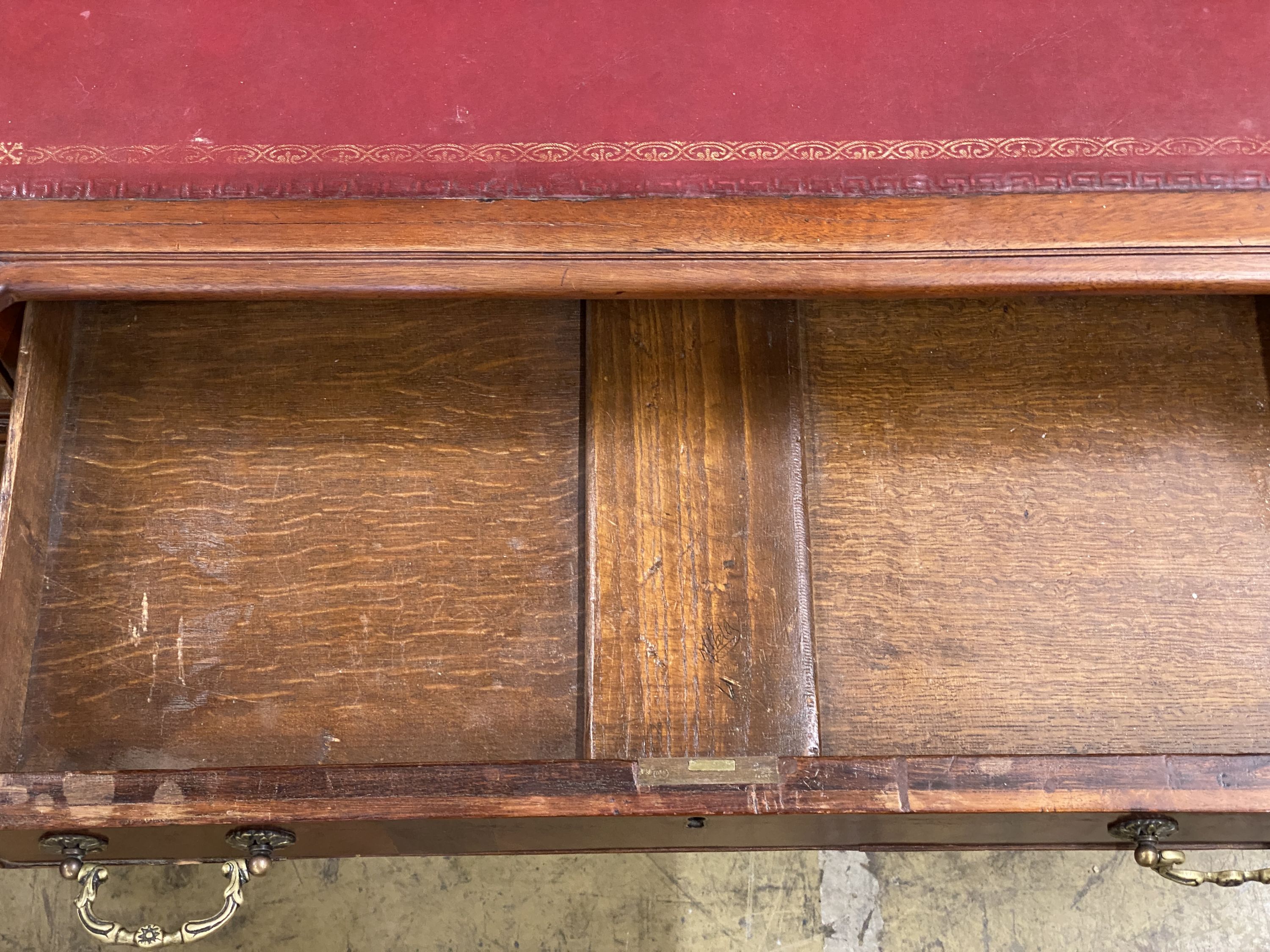 A mahogany breakfront pedestal desk, width 135cm